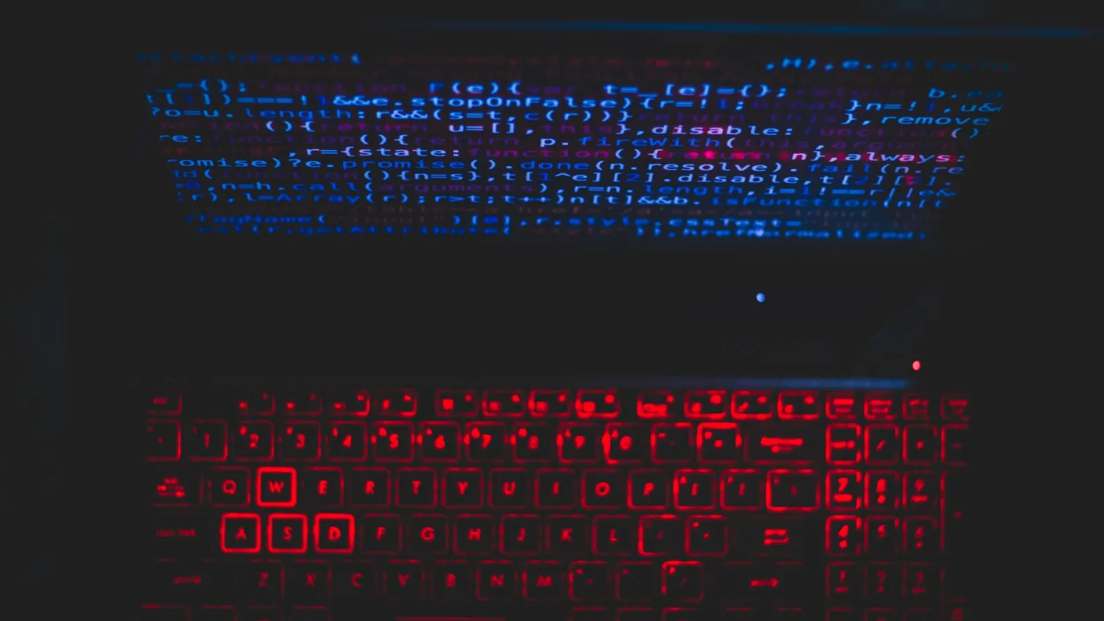 Developer reviewing AI agent output on a laptop screen